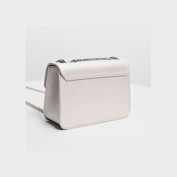 CHARLES & KEITH EMBELLISHED PUSH LOCK CLUTCH (PEARL)