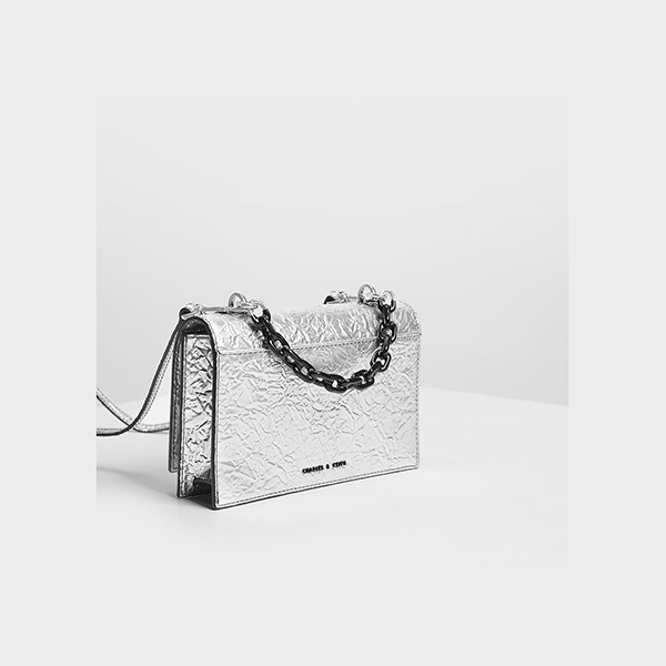 CHARLES & KEITH SINGLE CHAIN HANDLE PUSH LOCK BAG (SILVER)