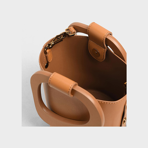 CHARLES & KEITH SCULPTURAL HANDLE BUCKET BAG